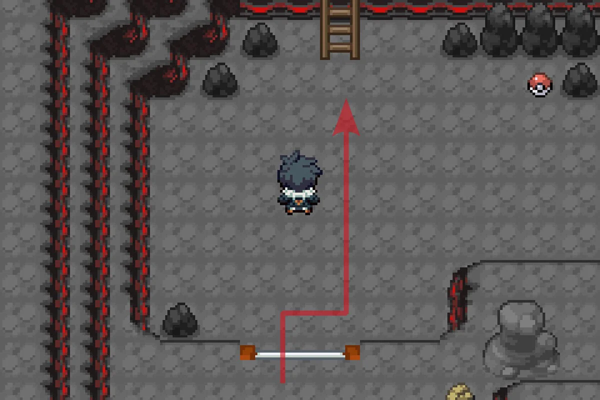 Climbing the ladder north of the Cinder Volcano entrance. / Pokémon Unbound