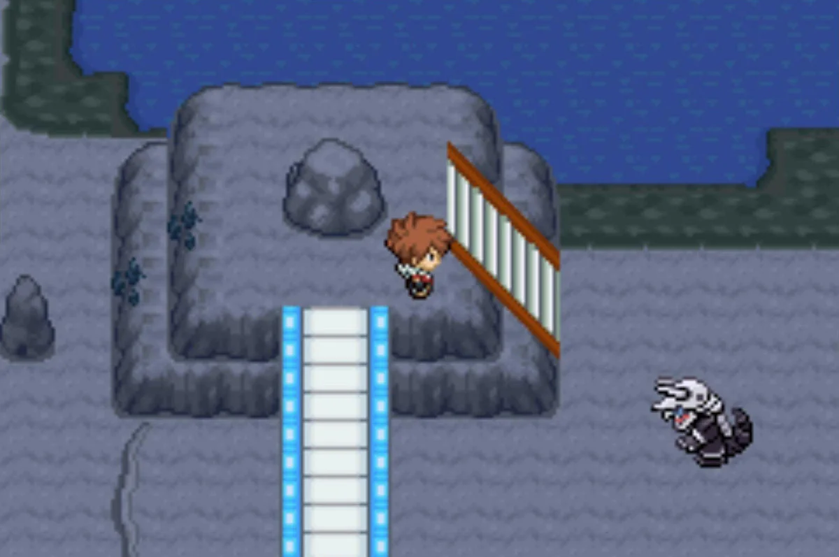 Climb the rock wall and you’ll see an Aggron below / Pokémon Unbound