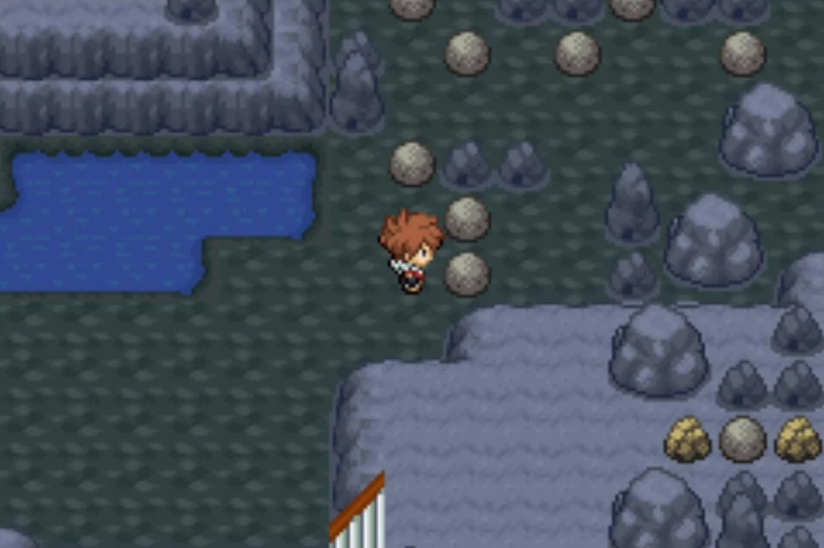 Move a couple of boulders to get past / Pokémon Unbound